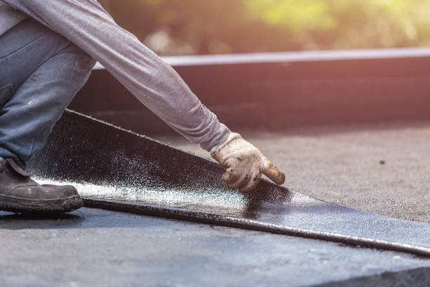 Professional Basement Waterproofing technician working in Swain, NY